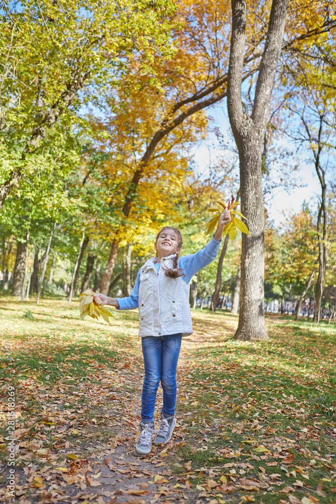 Beautiful happy girl in autumn park Beautiful happy girl in autumn park