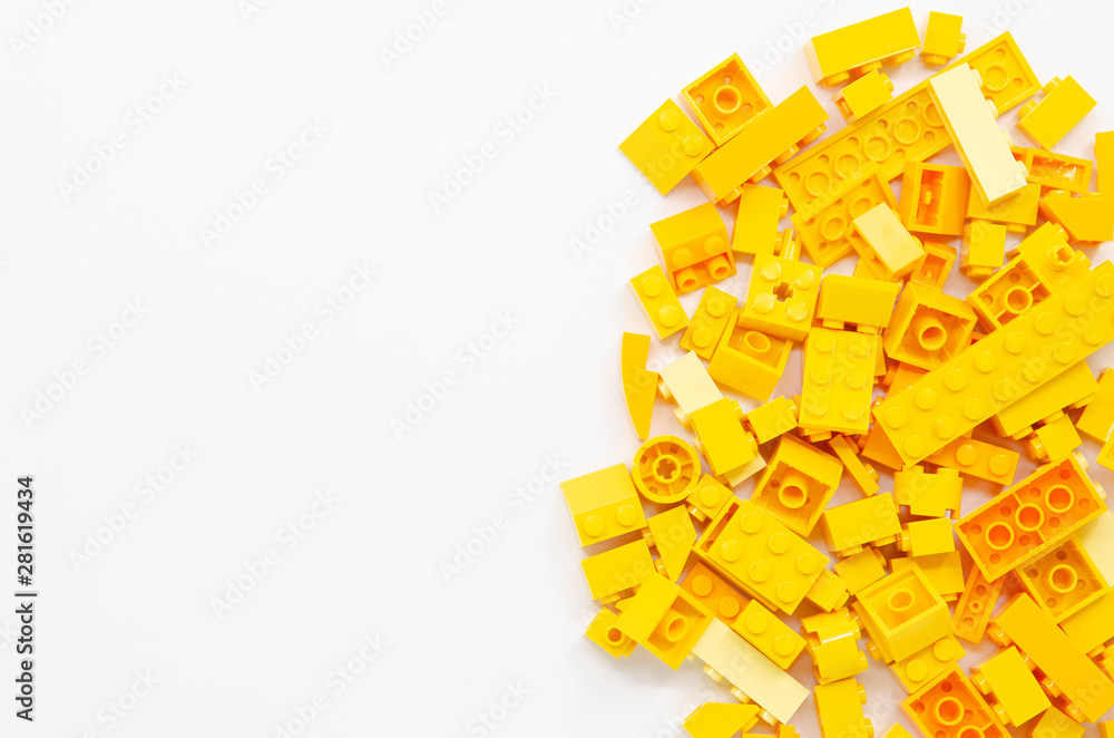 Yellow Educational Toys Bricks Blocks Top View isolated on White Background