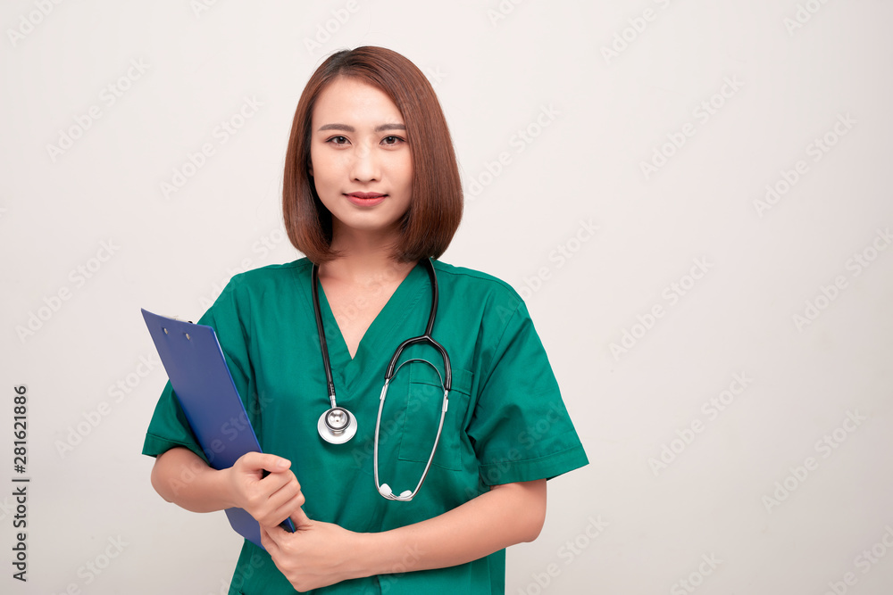 Asian nurse woman with a folder , isolated on white background Asian nurse woman with a folder , isolated on white background