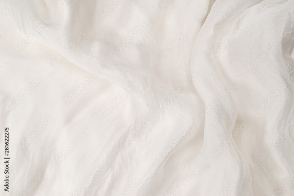 Soft smooth white silk fabric background. Fabric texture. Soft smooth white silk fabric background. Fabric texture.