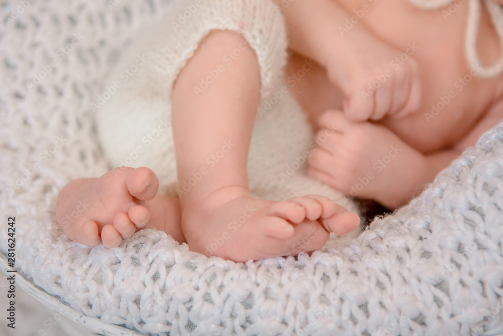Photo of newborn baby feet, soft focus. Photo of newborn baby feet, soft focus.