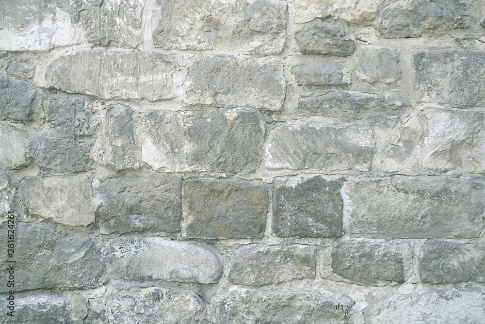 Grey stone mosaic wall background Grey stone mosaic wall background
