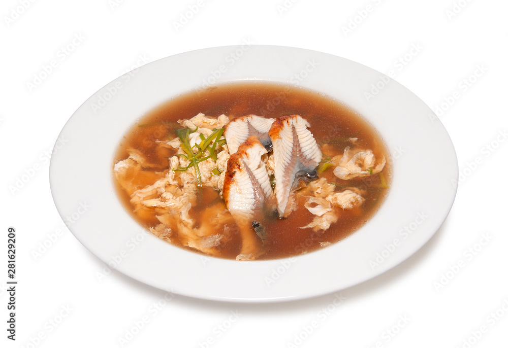 fish soup with vegetables isolated on white background fish soup with vegetables isolated on white background