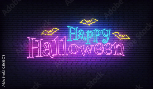 Halloween neon vector sign. Glowing Halloween neon typography with flying bats