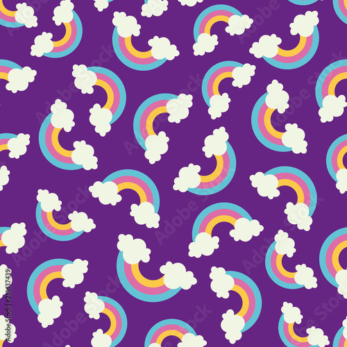 Seamless pattern with rainbows and clouds