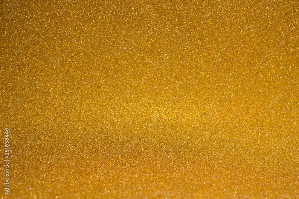 abstract blurred golden background with shiny bokeh abstract blurred golden background with shiny bokeh
