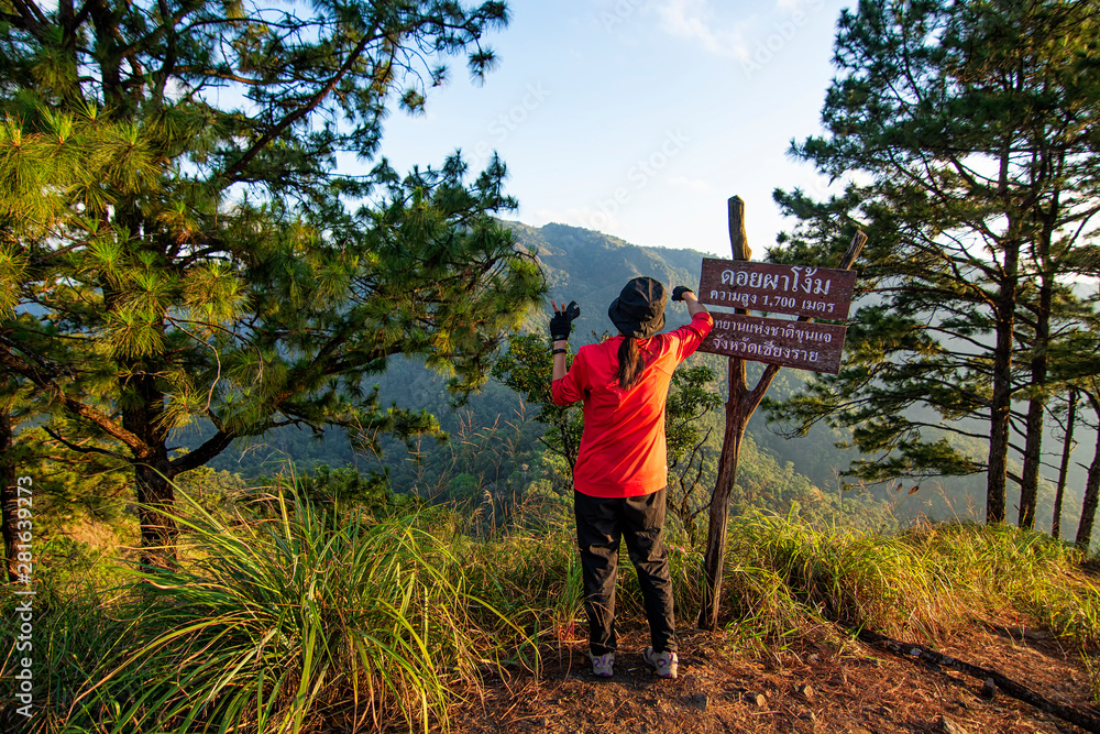 Tourists stand in mountain view on December 26,2015 in Chiangmai,Thailand. Tourists stand in mountain view on December 26,2015 in Chiangmai,Thailand.