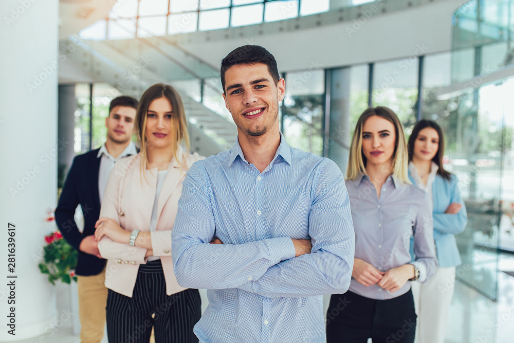 Group of happy business people and company staff in modern office, representing company Group of happy business people and company staff in modern office, representing company
