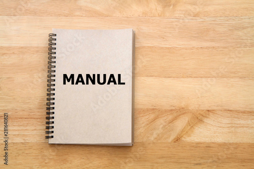 User manual or Instruction manual book on wooden desk photo