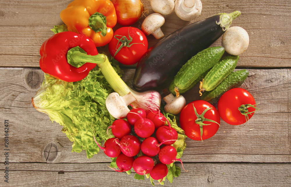 Fresh vegetables on a clean wooden table Fresh vegetables on a clean wooden table