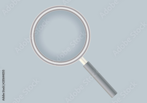 Lupa de mando negro sobre fondo gris.