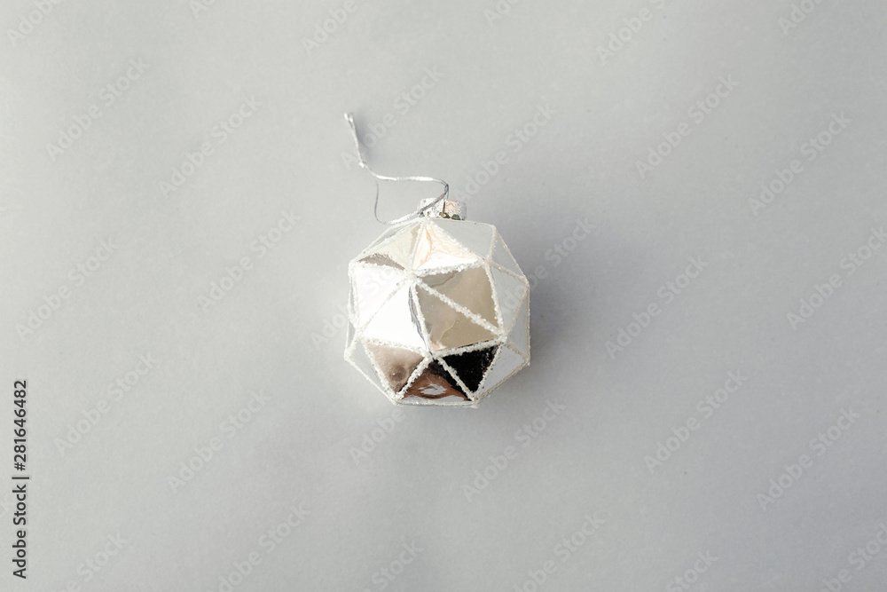 Φωτογραφία Christmas vintage white ornament on grey paper, flat lay