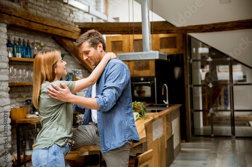 Cute young couple hugging w...