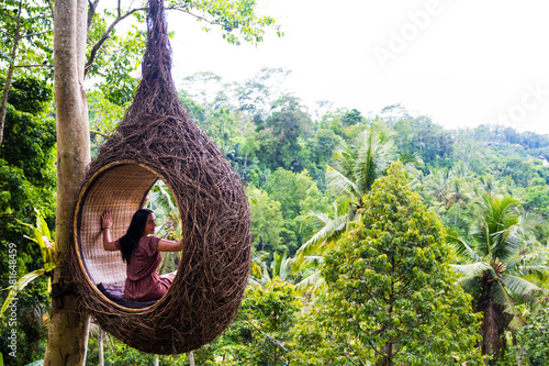 A female tourist is sitting...