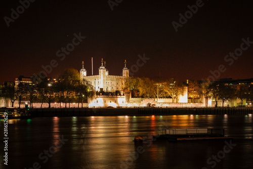 Tower of London at night  view across the River Thames  London  England