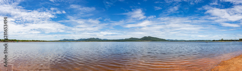 Panorama of Huay Mai Teng reservoir with beautiful blue sky and clouds in Ratchaburi Province