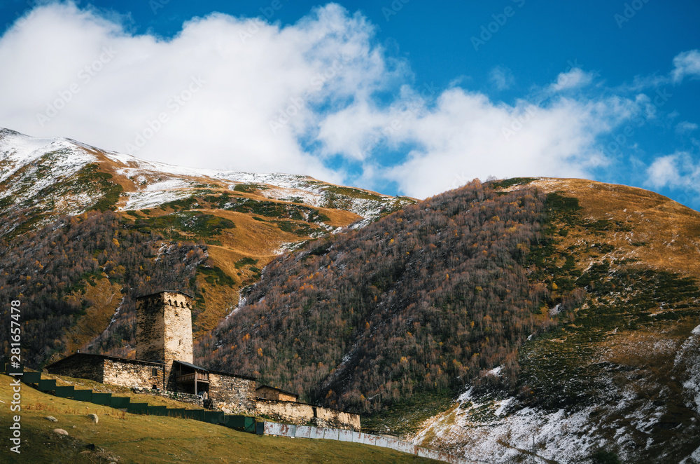 Fototapeta premium Lamaria old church in village Ushguli Upper Svaneti region in autumn, Georgia