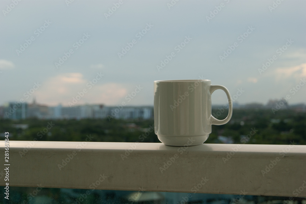 Coffee Cup on Balcony
