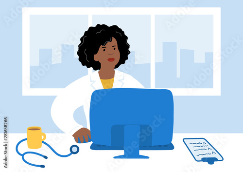 Online medicine. Female african doctor siitting near computer.