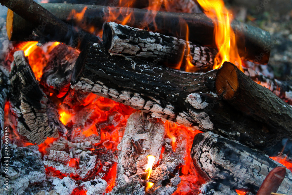 Beautiful countryside summer celebration view of burning wood from middle. Beautiful countryside summer celebration view of burning wood from middle.