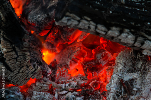 Beautiful countryside summer celebration view of burning wood from middle.