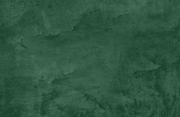 Dark green Concrete textured background to your concept or product. Winter 2020 color trend.