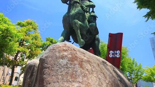 Tilt up view of Yukimura Sanada statue photo