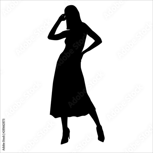 Vector silhouette of beautiful stylish girl posing in long skirt