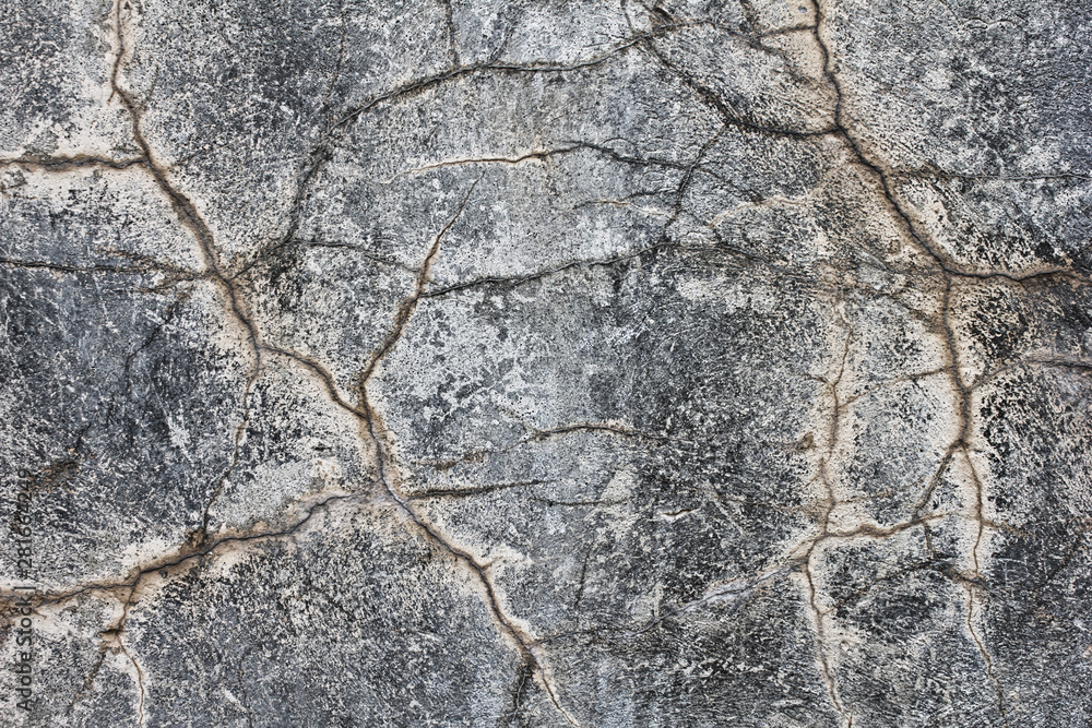 Crack stone texture. Concrete grey wall with a crack on it. Crack stone texture. Concrete grey wall with a crack on it.
