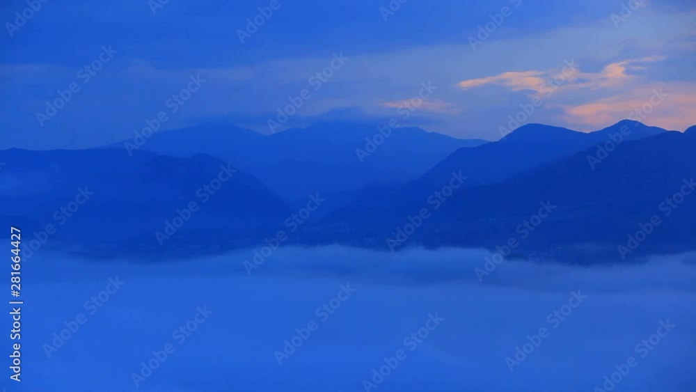 Mountain range above fog at sunrise, Ueda, Nagano Prefecture, Japan Mountain range above fog at sunrise, Ueda, Nagano Prefecture, Japan