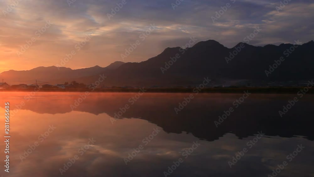 Zoom out of mountain reflecting in lake, Japan Zoom out of mountain reflecting in lake, Japan