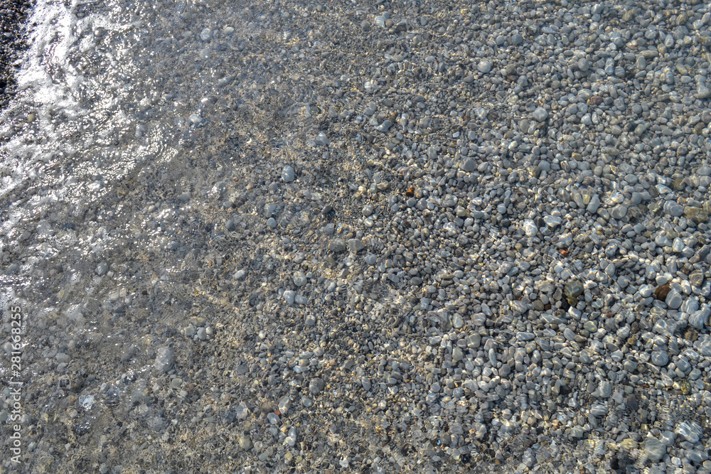 Sea pebbles. Small stones gravel texture background. Pile of pebbles, thailand.Color stone in background. Sea pebbles. Small stones gravel texture background. Pile of pebbles, thailand.Color stone in background.