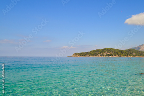 Beautiful sea view. Calm azure sea with breezes of the sun on the water. Mediterranean Sea