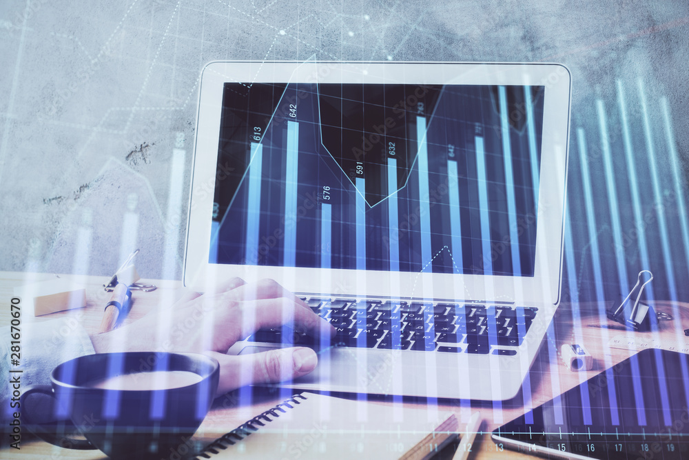 Forex graph with businessman working on computer in office on background. Concept of hardworking. Double exposure. Forex graph with businessman working on computer in office on background. Concept of hardworking. Double exposure.