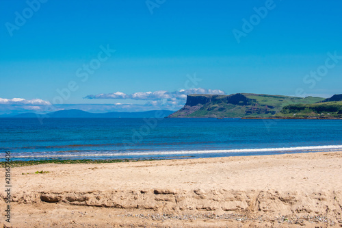 Coast of Atlantic Ocean in Ballycastle Northern Ireland. Summer sunny day, clear blue sky 