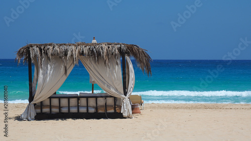 Marsa Matruh  Egypt. Elegant gazebo on the beach. Amazing sea with tropical blue  turquoise and green colors. Relaxing context. Nobody on the beach. Fabulous holidays. Mediterranean Sea. North Africa