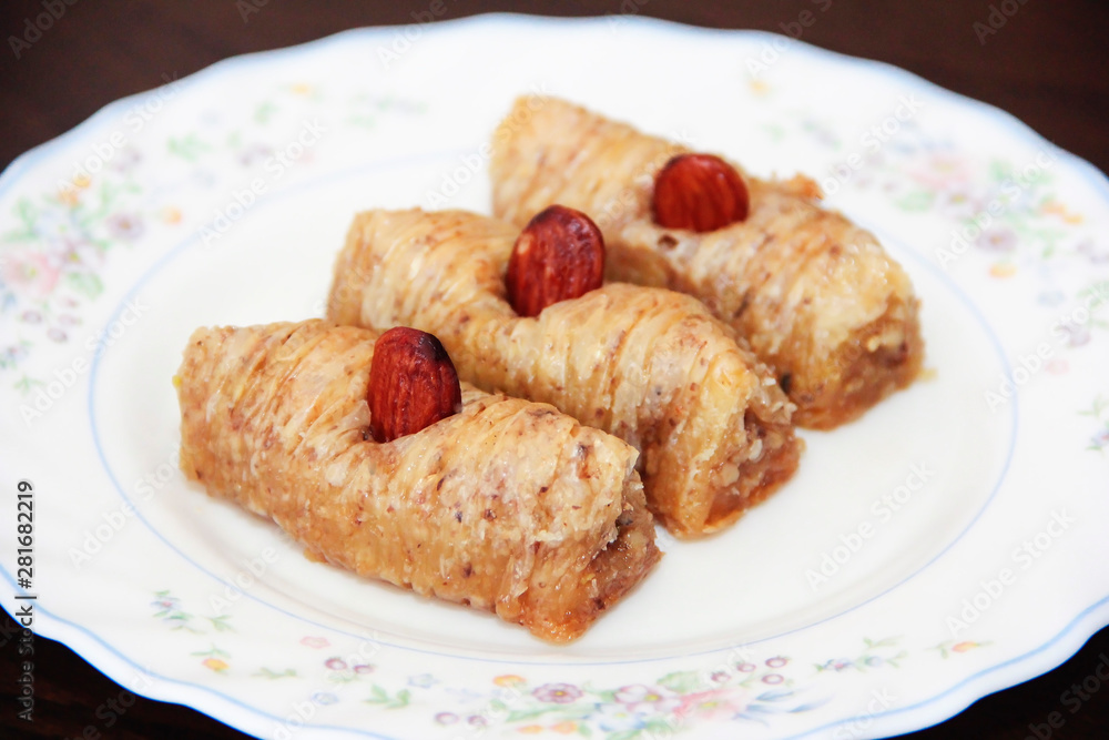traditional Turkish Arabian oriental sweetness baklava on white plate traditional Turkish Arabian oriental sweetness baklava on white plate