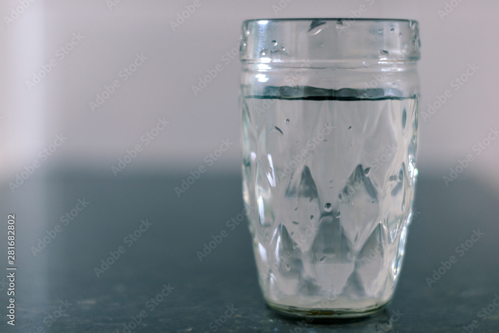 Cup with water on the table Cup with water on the table
