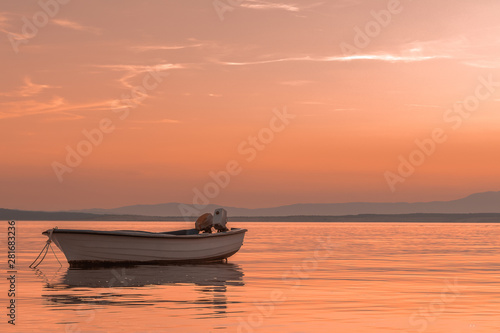 boat at sunset © madnessmilo