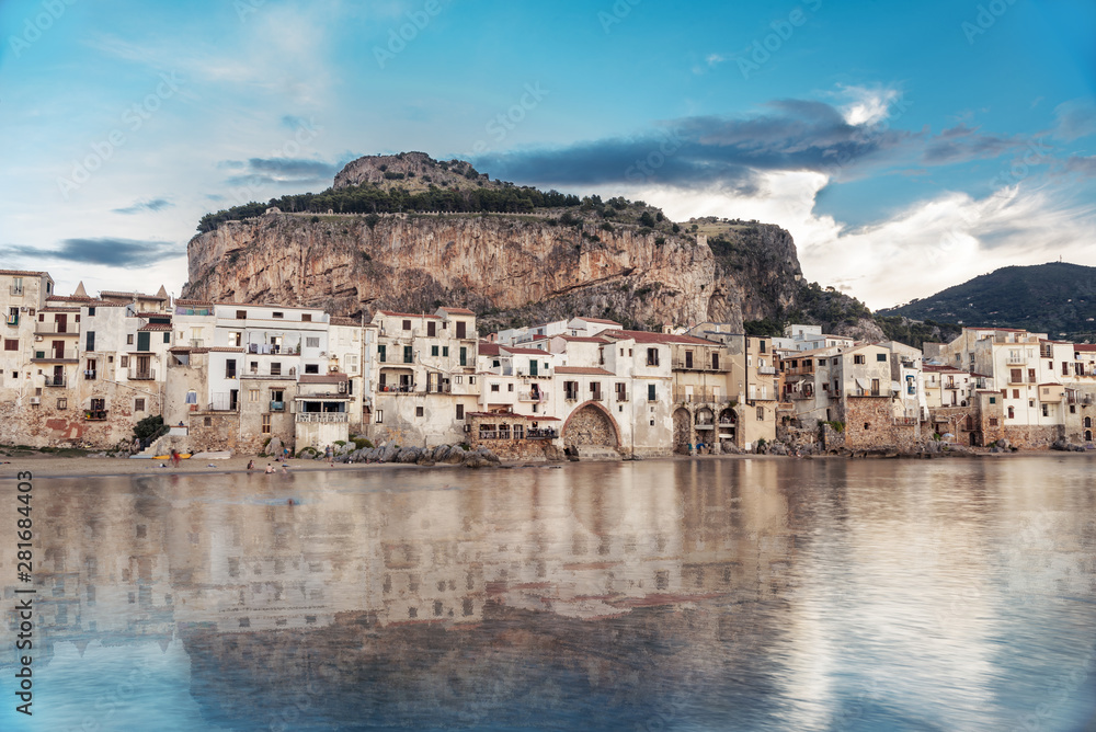 Old town of Cefalu in retro colors on the seaside in Sicily island - Italy