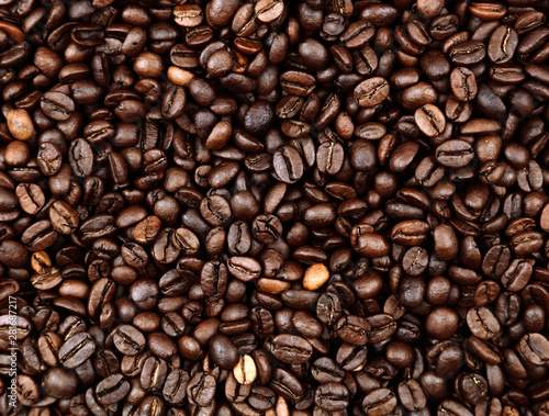 Dark roasted coffee beans background