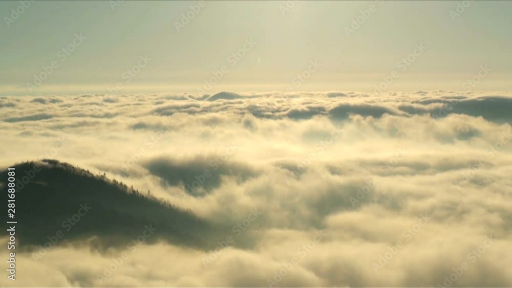 Hikada mountains rising above sea of clouds, Hokkaido, Japan Hikada mountains rising above sea of clouds, Hokkaido, Japan