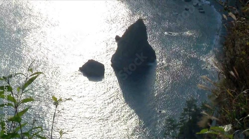 Rock formation seen from top of coastal cliff photo