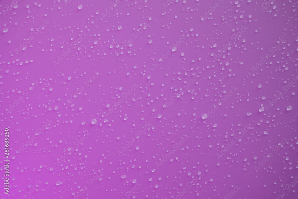 Raindrops on a purple background. Raindrops on a purple background.