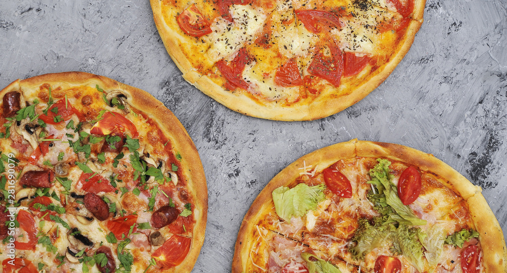 Delicious pizza on stone background. Delicious pizza on stone background.
