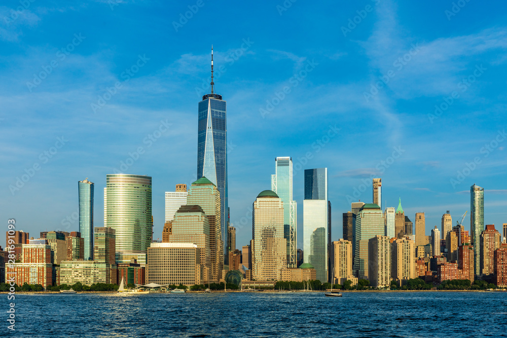 Fototapeta premium View to Lower Manhattan Skyline from Exchange Place in Jersey City at sunset.