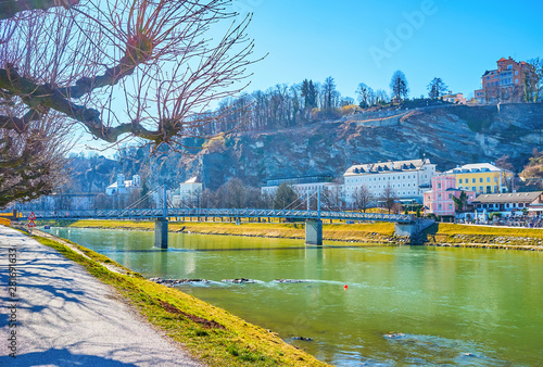 The modern bridge across the river in Salzburg, Austria photo