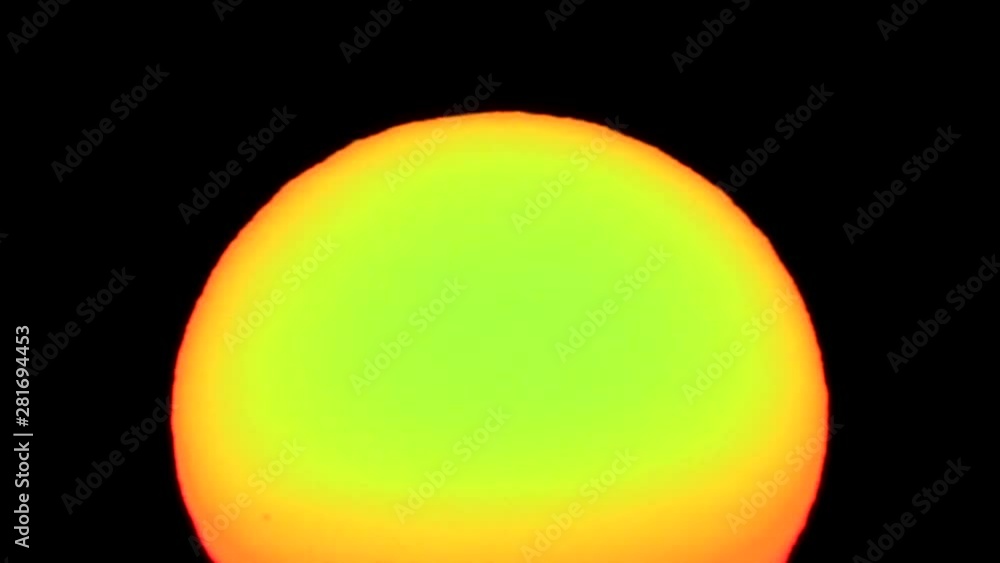 Close up of sun in sky at sunrise, Japan Close up of sun in sky at sunrise, Japan