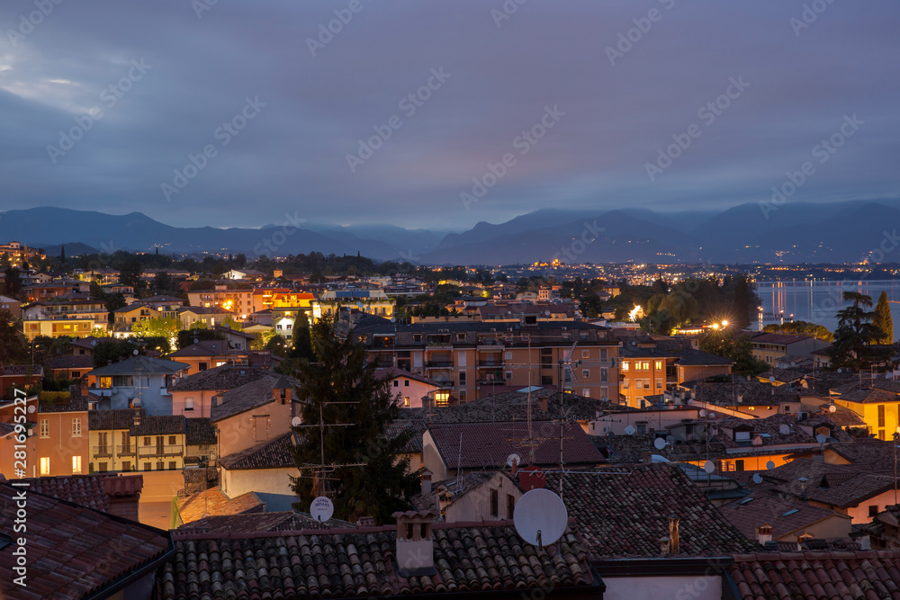 View of Desenzano at night.Skyline of Desenzano del Garda,Italy