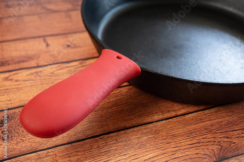 Protect from burning hands with a silicone cover for your cast iron skillet.